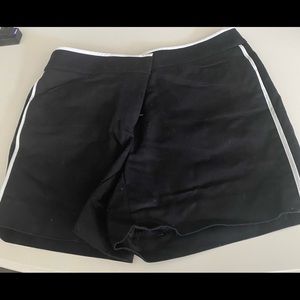 Black shorts with white stripe